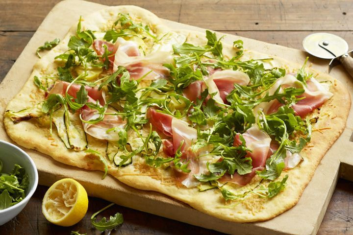 Pizza bianca with zucchini, potatoes and prosciutto