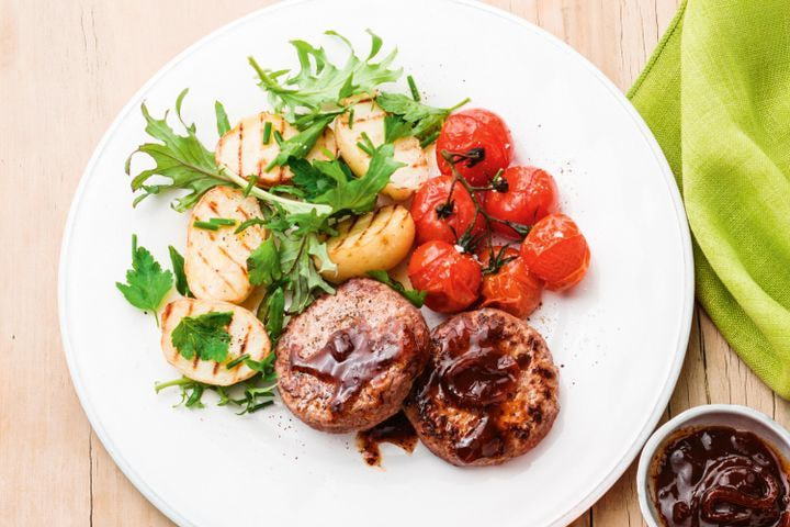 Caramelised onion rissoles with charred potato salad