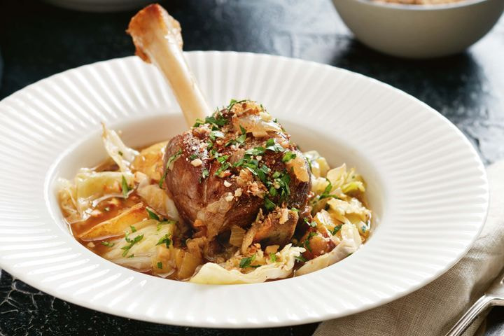 Braised lamb shanks with cabbage, potatoes and caraway dukkah
