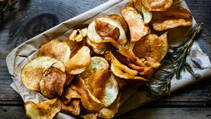 Homemade garlic and rosemary potato chips