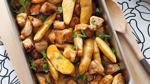 Baked sausages with potatoes and rosemary