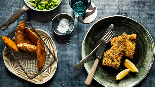 Baked fish and chips with broad beans
