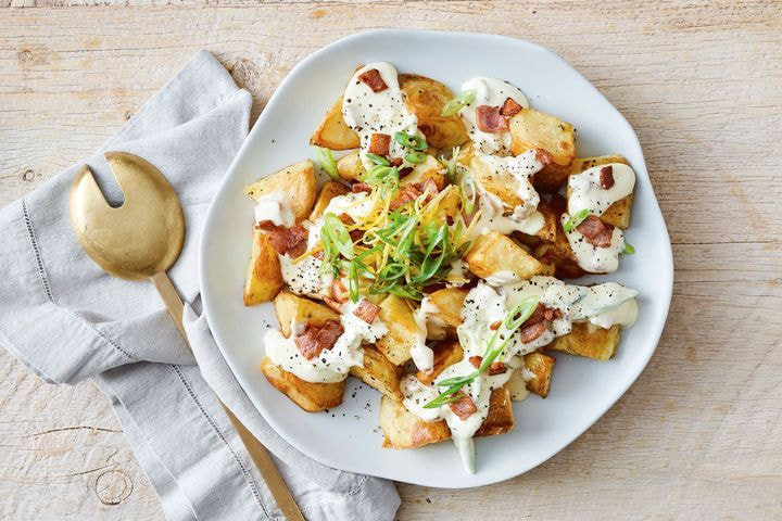 Warm potato salad with cheesy sauce