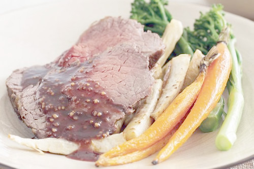 Beef roast with quince glaze, parsnips and carrots