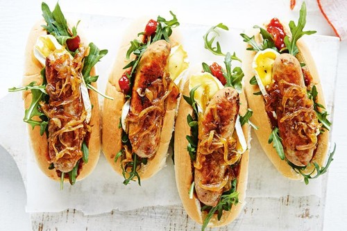 Caramelised onion and brie hot dogs