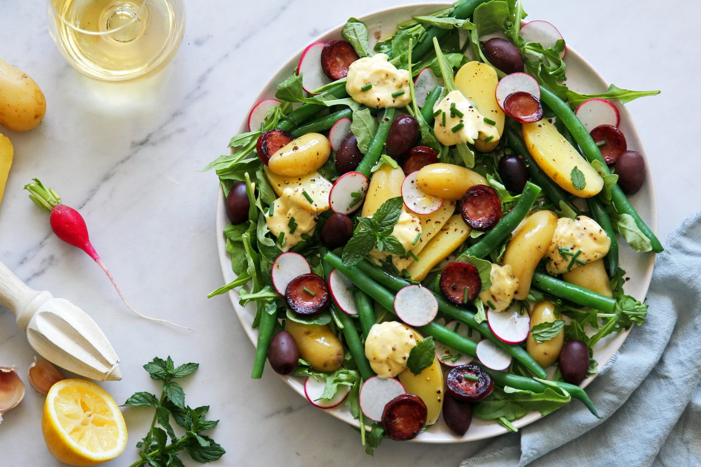Perlas potato salad w/ chorizo, olives, green beans & lemony mayo